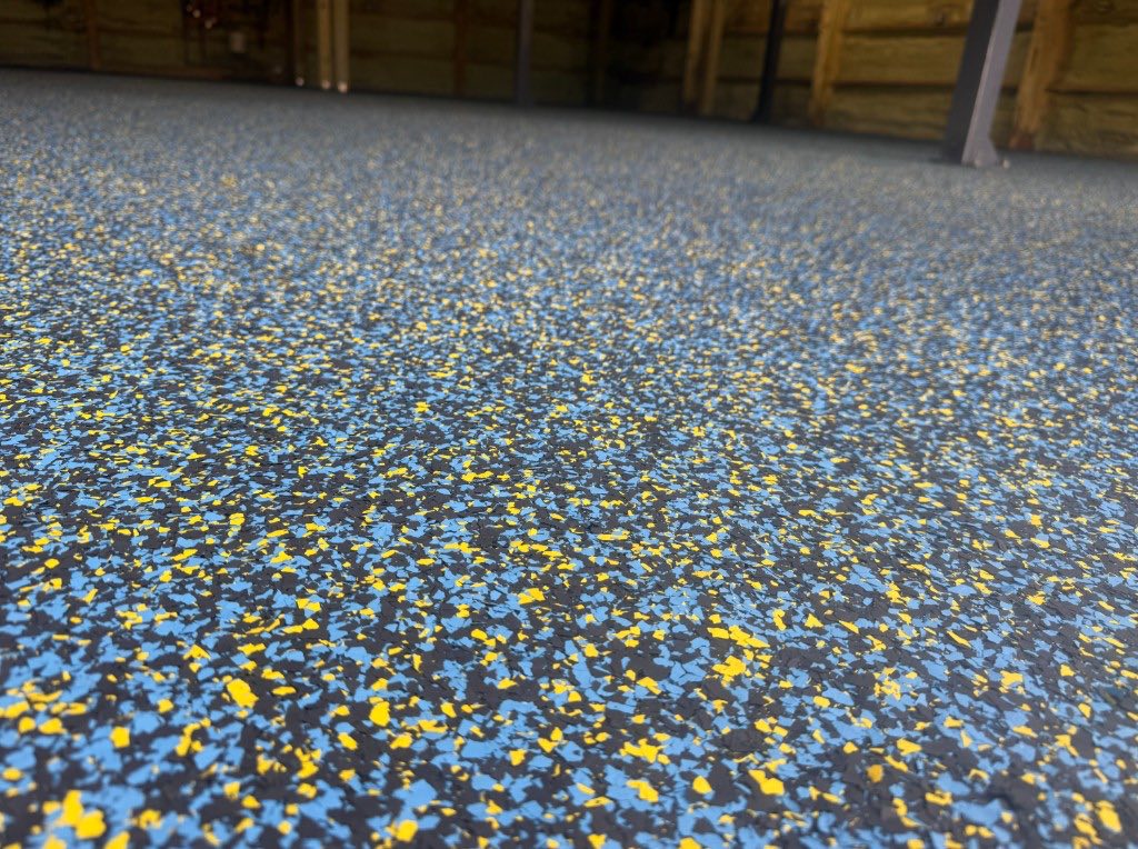 Blue and yellow flake epoxy floor detail