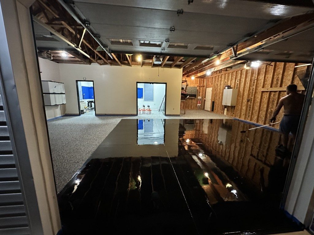 Garage flake epoxy system being poured
